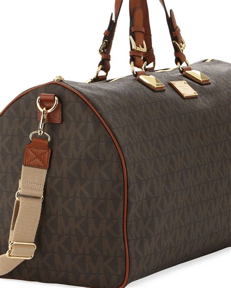 michael kors portemonnaie luggage|Michael Kors duffle bag.